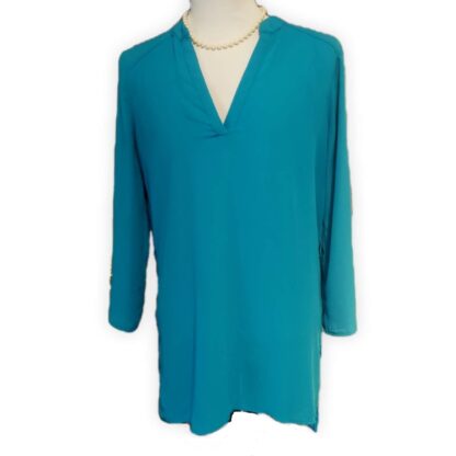 Full coverage to the hips with option of long or 3/4 sleeves includes low v collar. Silk like feel for breathable comfort.